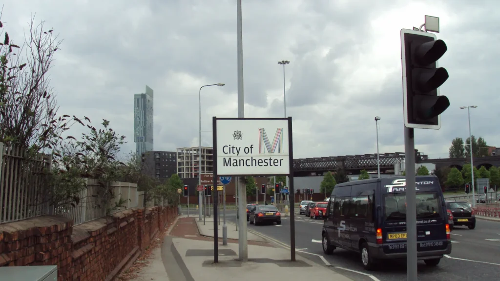 Sign on the A57 Regent Road on entering the City of Manchester from Salford, Greater Manchester.