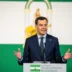 Juanma Moreno Bonilla with Andalusia flag